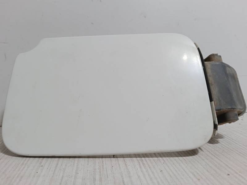 TAPA EXTERIOR COMBUSTIBLE 