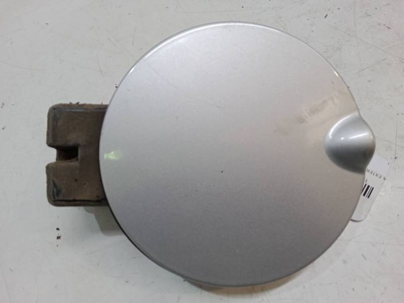 TAPA EXTERIOR COMBUSTIBLE 