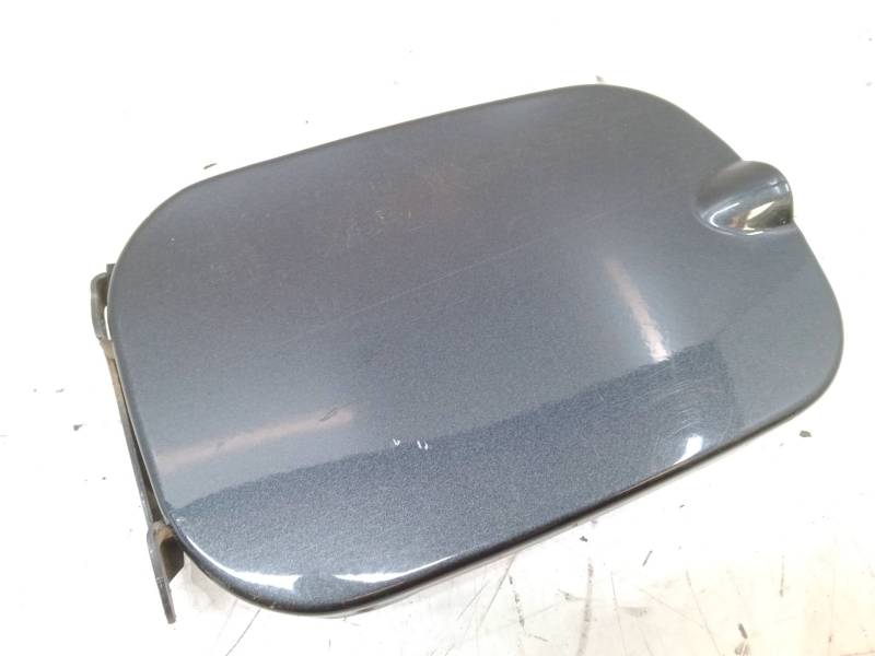 TAPA EXTERIOR COMBUSTIBLE 