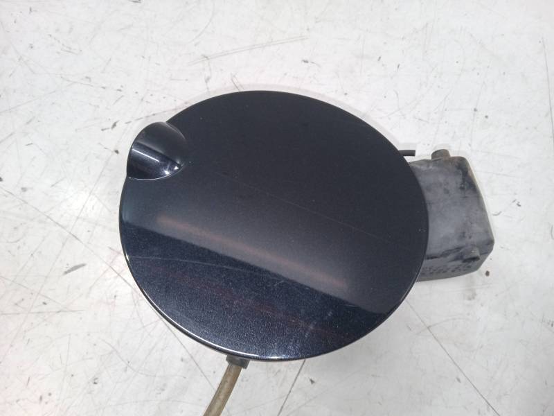 TAPA EXTERIOR COMBUSTIBLE 