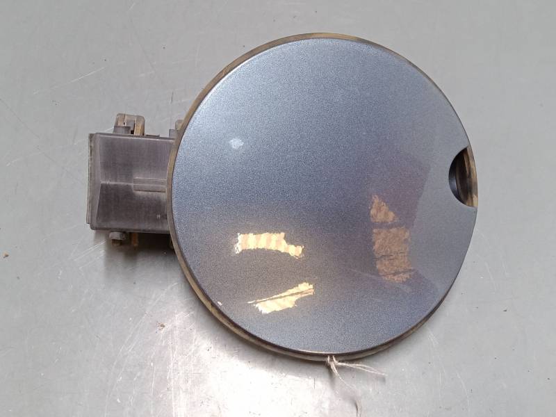 TAPA EXTERIOR COMBUSTIBLE 