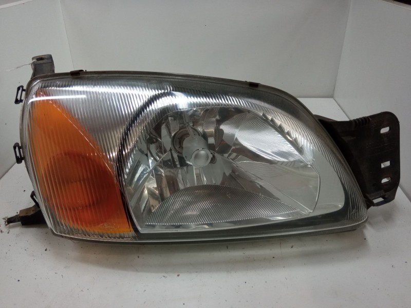 Recambio de faro derecho para ford courier referencia OEM IAM   