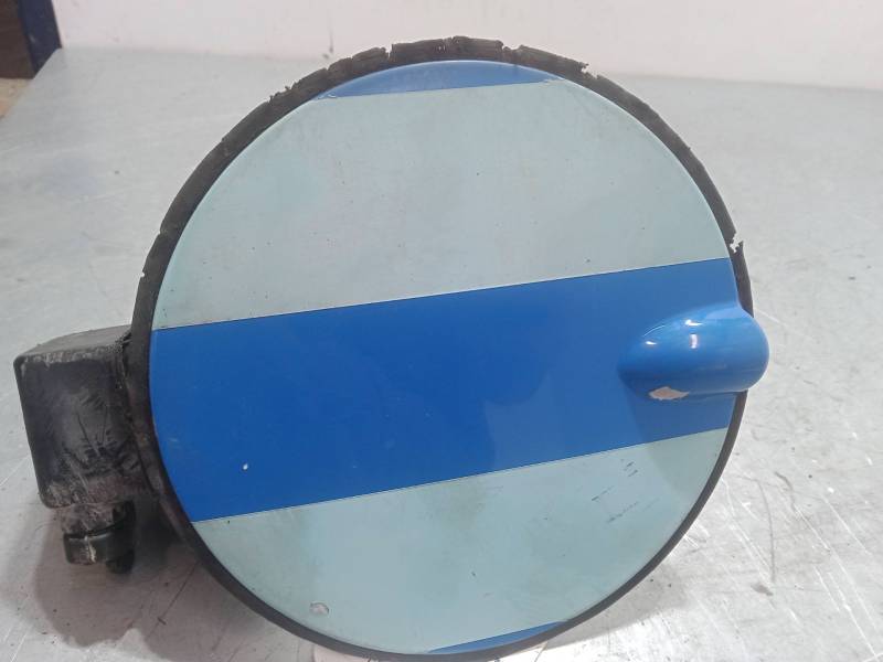 TAPA EXTERIOR COMBUSTIBLE 