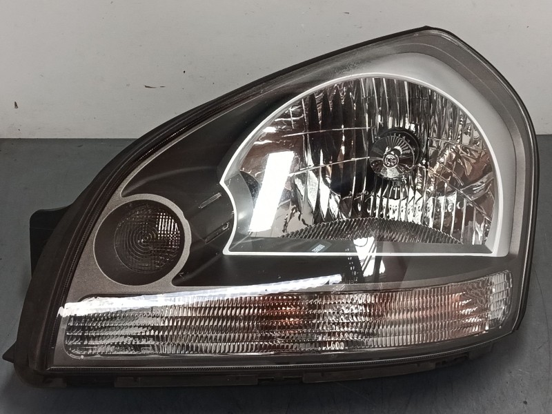 Recambio de faro izquierdo para hyundai tucson (jm) 2.0 referencia OEM IAM 921012EXXX  