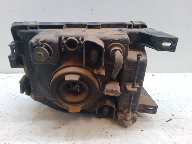 Recambio de faro izquierdo para mitsubishi galloper (jk-01) 2.5 td referencia OEM IAM   