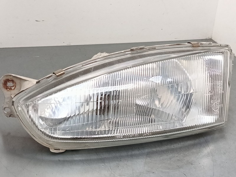 Recambio de faro izquierdo para mitsubishi colt v (cj_, cp_) 1300 gl,glx (cj1a) referencia OEM IAM 10087148  