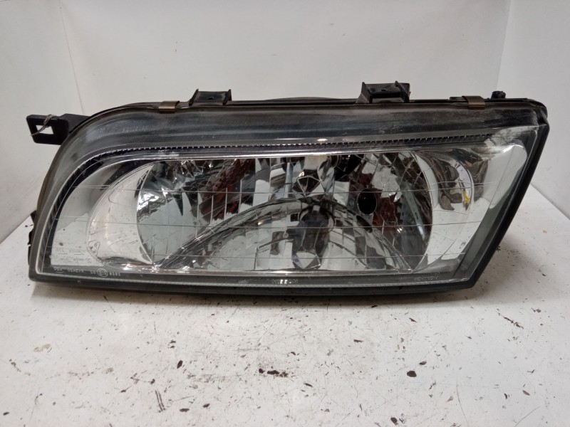 Recambio de faro izquierdo para nissan almera i hatchback (n15) 1.4 referencia OEM IAM   