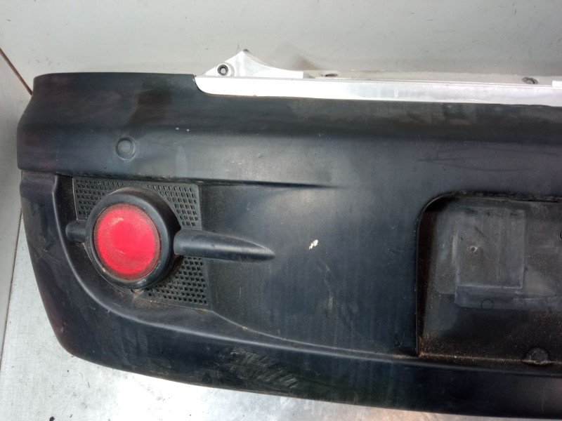 Recambio de paragolpes trasero para ssangyong actyon i 2.0 xdi referencia OEM IAM 7881031213ABT  