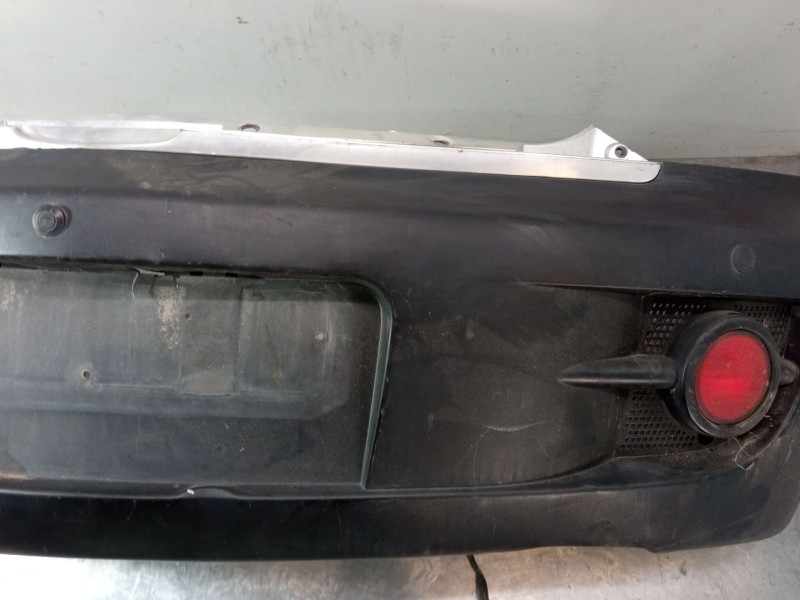 Recambio de paragolpes trasero para ssangyong actyon i 2.0 xdi referencia OEM IAM 7881031213ABT  