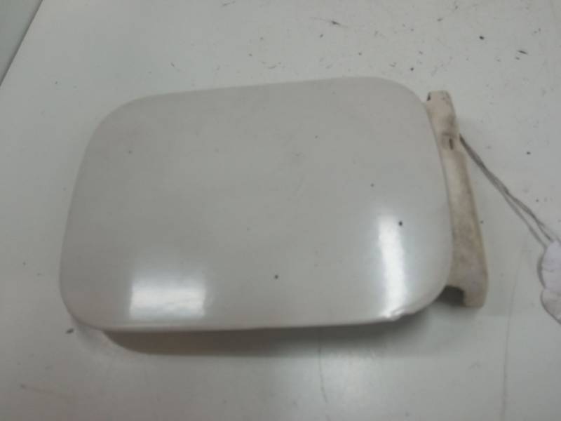 TAPA EXTERIOR COMBUSTIBLE 