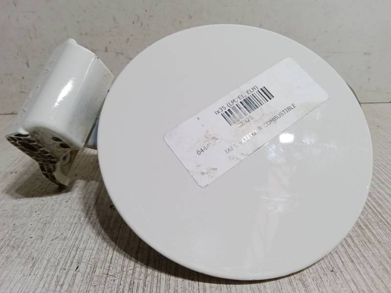 TAPA EXTERIOR COMBUSTIBLE 