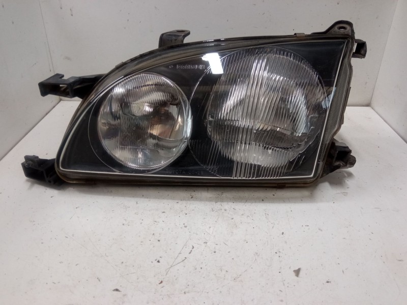 Recambio de faro izquierdo para toyota avensis liftback (_t22_) 1.6 (at220_) referencia OEM IAM   