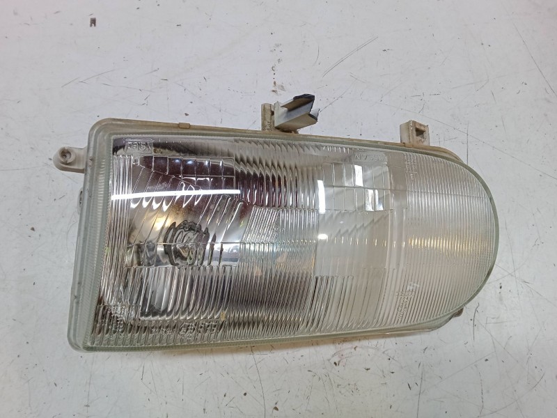 Recambio de faro izquierdo para nissan vanette cargo furgoneta (hc 23) 2.3 d referencia OEM IAM   