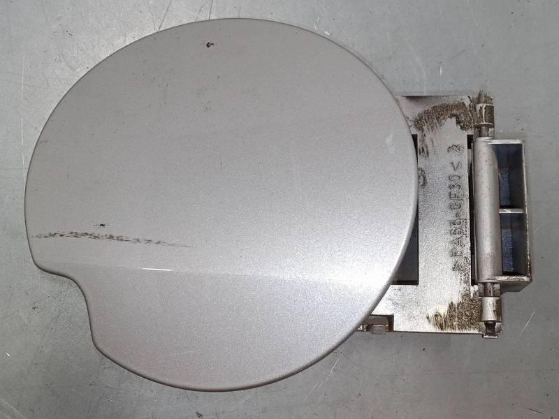 TAPA EXTERIOR COMBUSTIBLE 