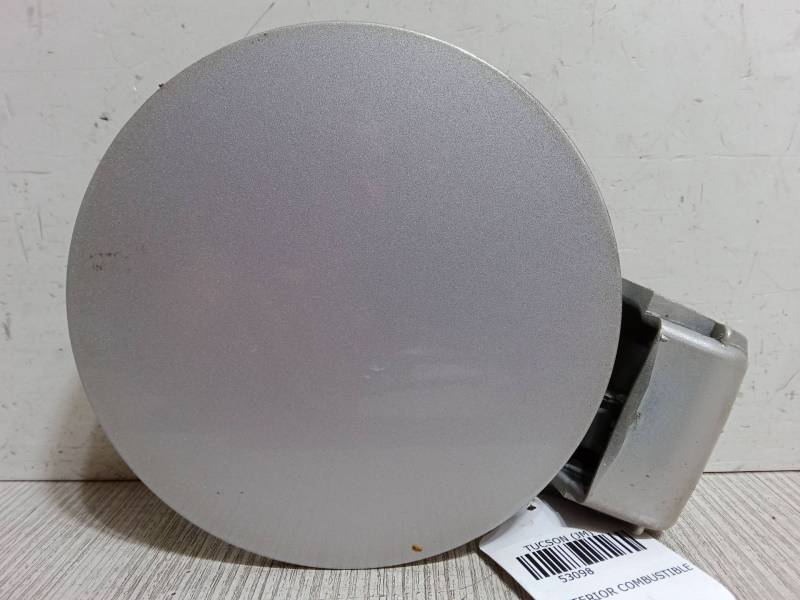 TAPA EXTERIOR COMBUSTIBLE 