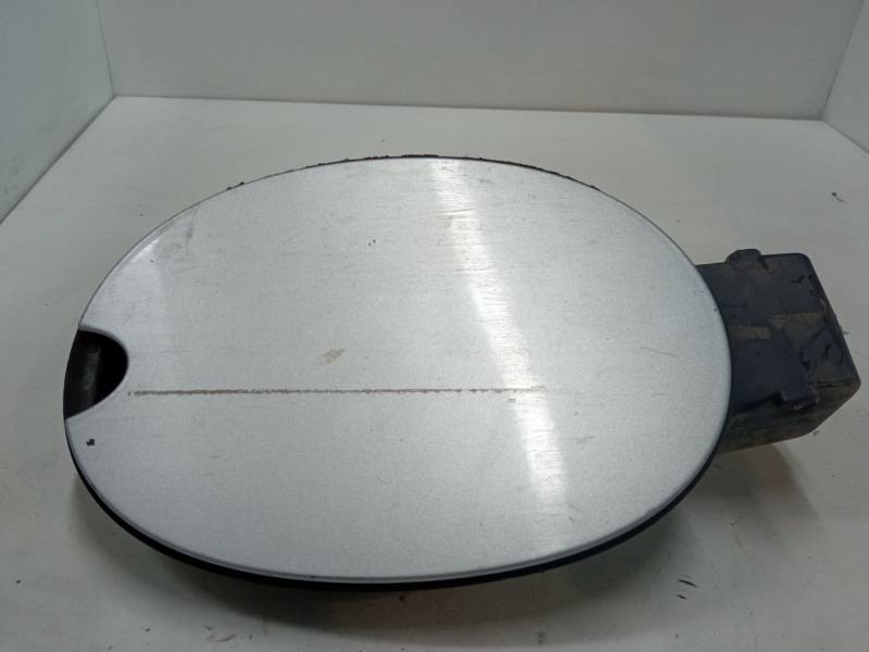 TAPA EXTERIOR COMBUSTIBLE 