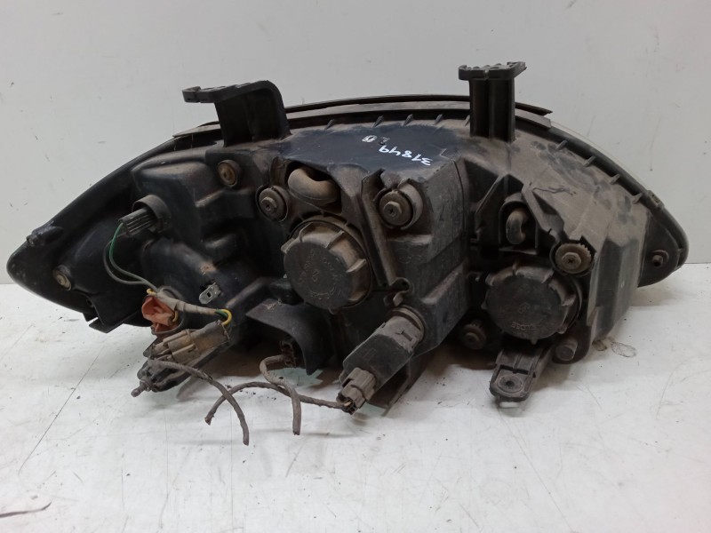 Recambio de faro izquierdo para ssangyong rodius i 2.7 xdi referencia OEM IAM   