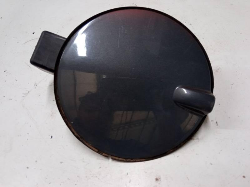 TAPA EXTERIOR COMBUSTIBLE 