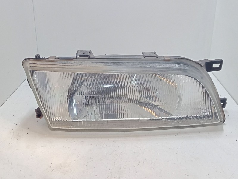 Recambio de faro derecho para nissan almera i hatchback (n15) 1.6 referencia OEM IAM   